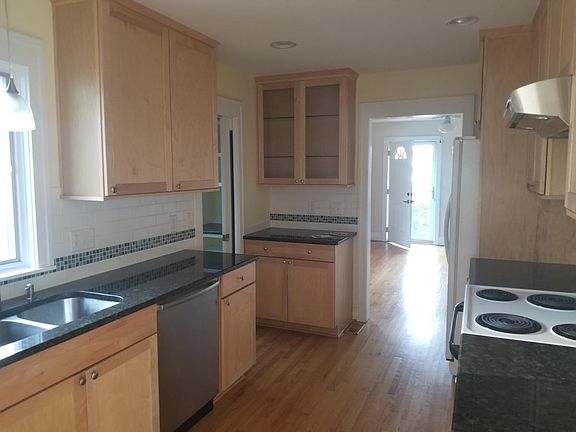 Bright kitchen with plenty of prep space, a pantry, and a dr