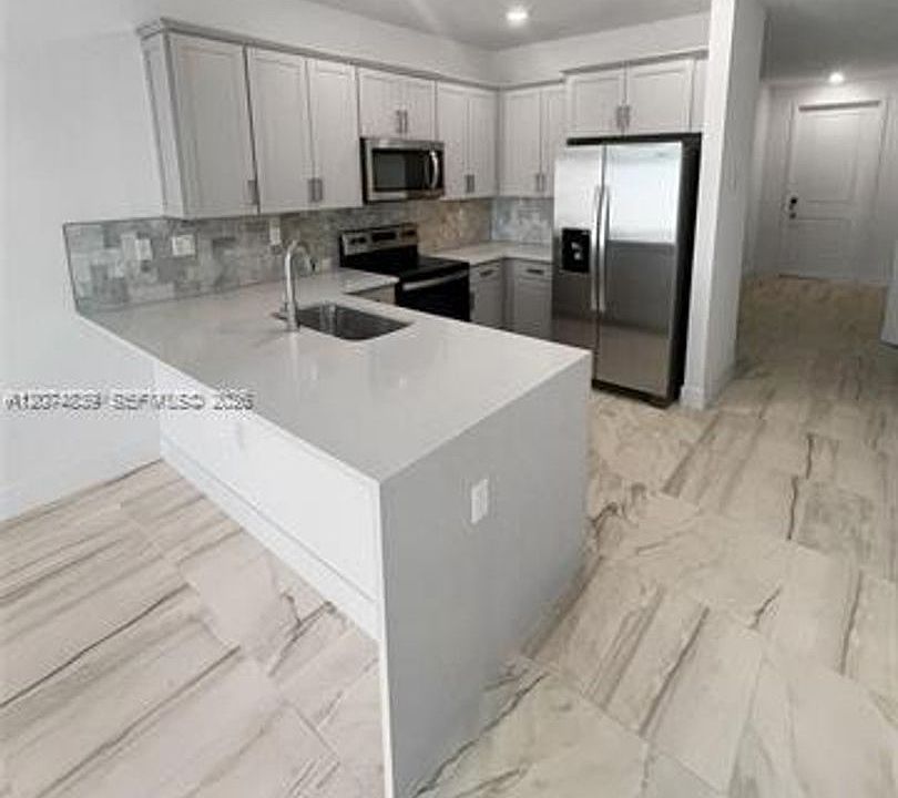 1st image of 17025 SW 1st St #Townhouse 17025