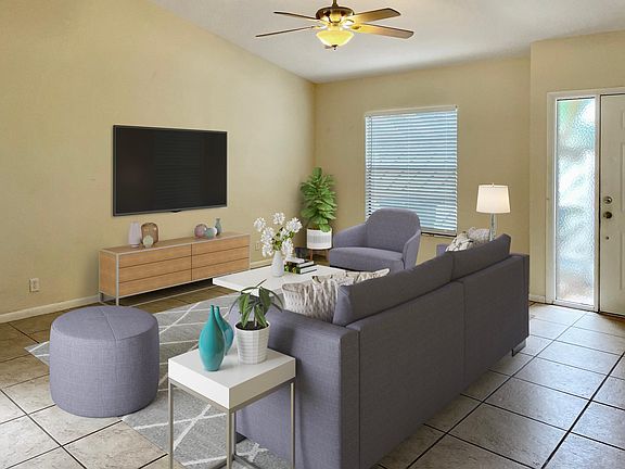 Open concept spacious living room with tons of natural light.