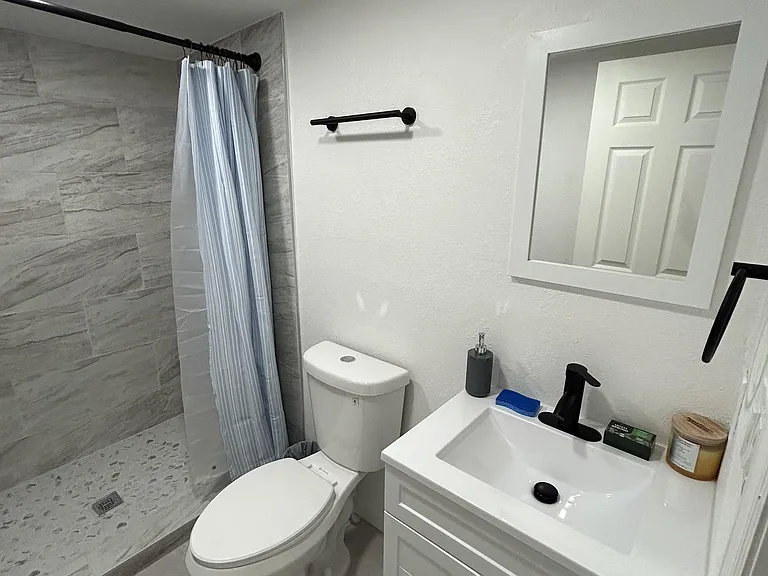 Bathroom 2, between rooms 3 and 4.