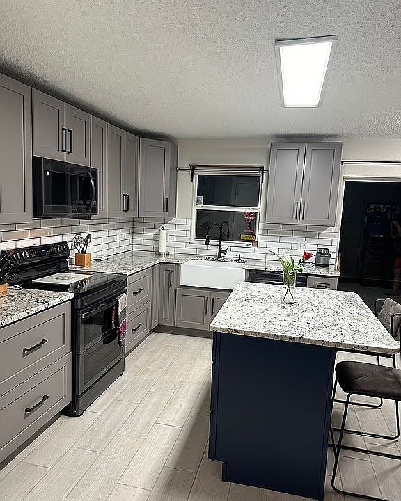 All new dark stainless steel