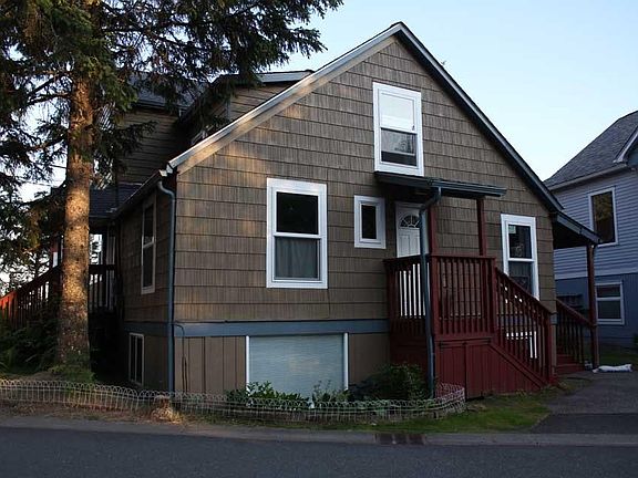 Entrance door into apartment. Window at lower left is living