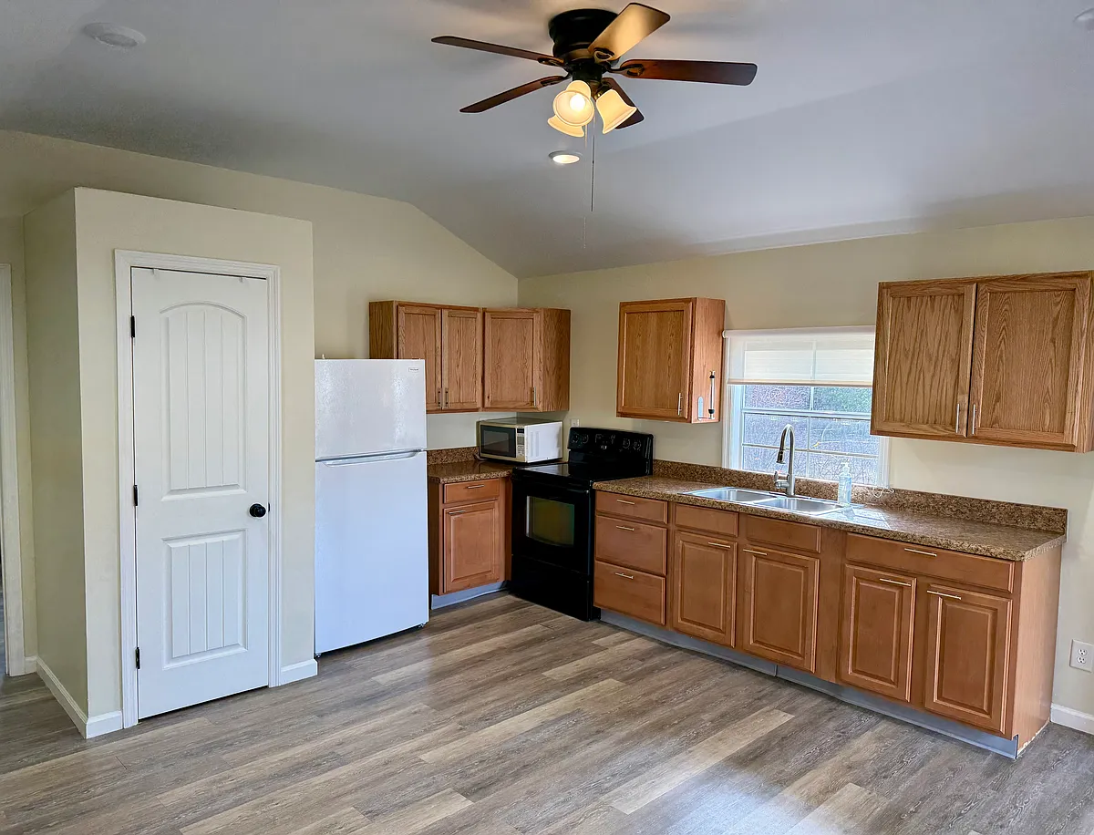 Kitchen view from living area - 420 Isbell Rd