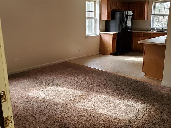 Living Room looking into the Kitchen area