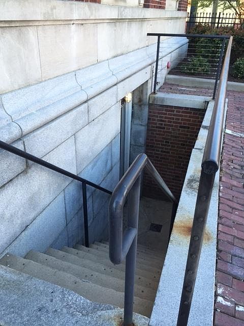 Entrance to apartment from gated lot.