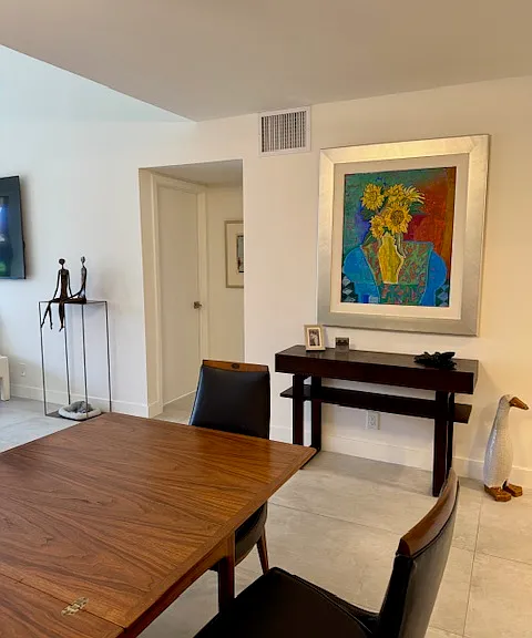 Dining area with entry to primary bedroom.