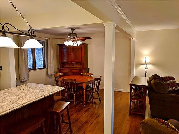 Freshly painted walls that make the Plymouth brown hickory wood floors pop!