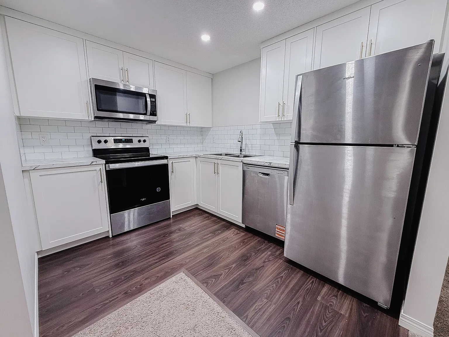 86 Creekside Manor SW, Calgary - Lower — Photo 2