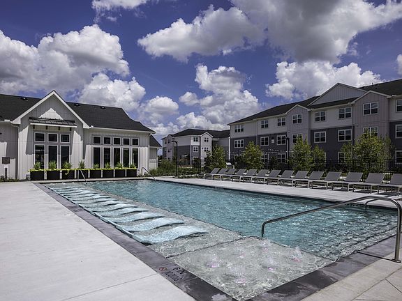 Resort-style pool with spacious sundeck at Beckett West Fork apartment homes in Conroe, TX.