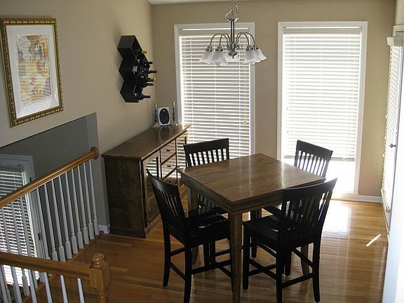 Kitchen dining area overlooks downstairs family room.  Plenty of light here!