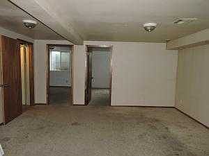 BASEMENT FAMILY/GAME ROOM LOOKING INTO BEDROOMS