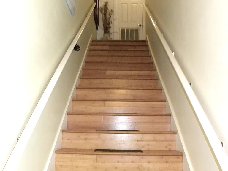 Wide Staircase with Carpet Treads to 2nd Floor