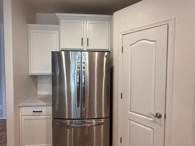 Fully updated kitchen with modern finishes and ample storage.