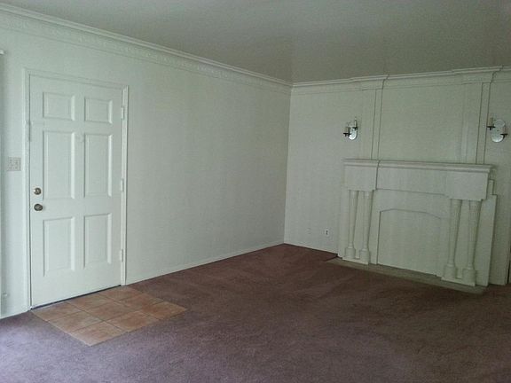 Living Room with faux fireplace