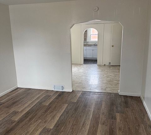 Front room/living area - dining room and kitchen entrance straight back