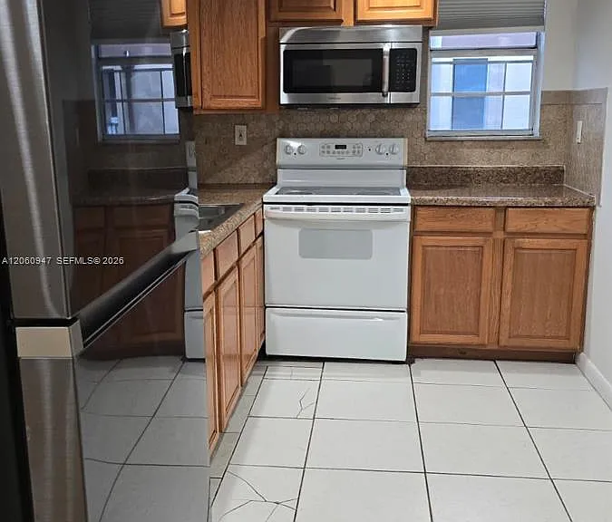 702 NW 87th Ave #309 — Photo 4