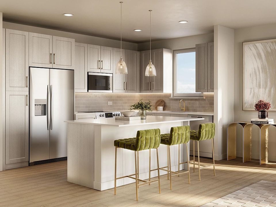 Open-concept apartment homes with chef's island, streamlined kitchen, and connected living areas designed for everyday flow and flexibility.