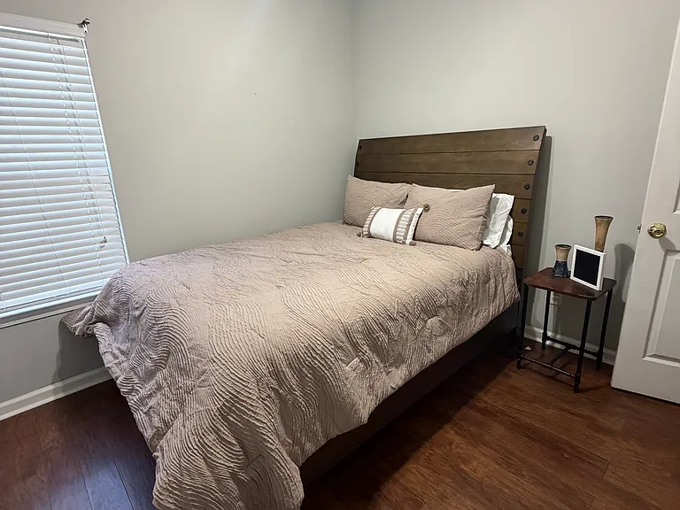 This room features a queen size bed with newly fresh linens