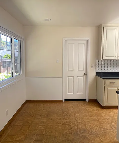 Dining nook and entry to garage