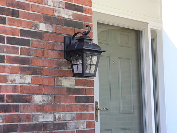 Dusk to Dawn lights, both in the front and back of house.