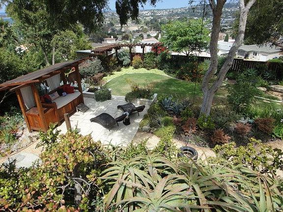 Private patio, daybed and gardens