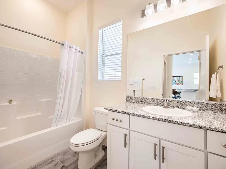Transform your daily routine in this elegantly designed bathroom space.