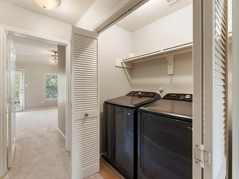 Utility room right outside of bedroom