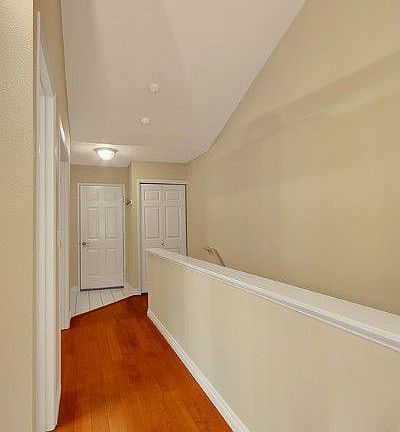 Gleaming but carefree laminate flooring thoughout main living areas.