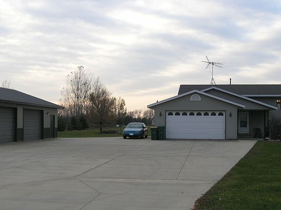 Fenced in Yard/Extensive concrete driveway area