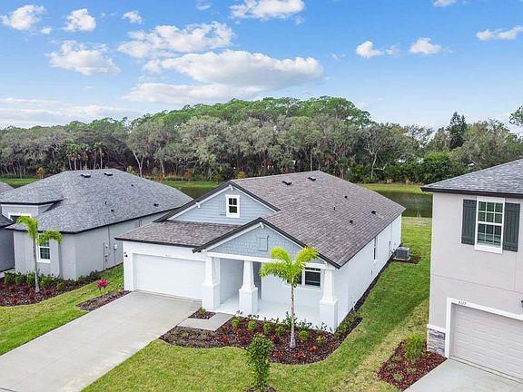 Sweetwater new construction quick move-in home 8123 Tea Olive Terrace right front angled view Palmet