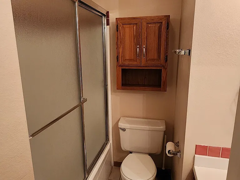 Restroom 2 with a shower and tub.