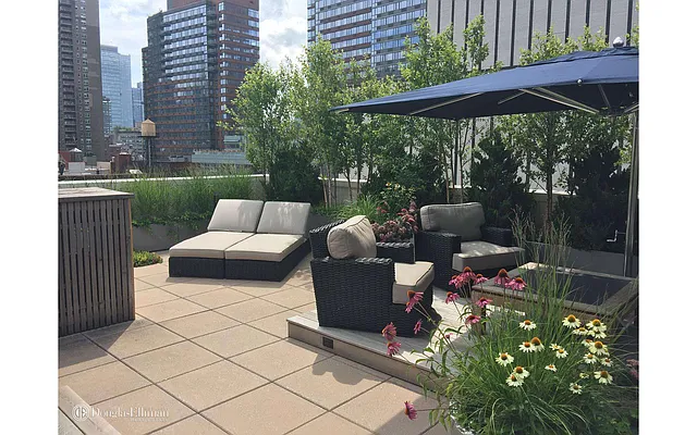 Sold by Douglas Elliman | media 13