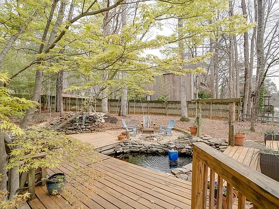 three koi ponds with two waterfalls