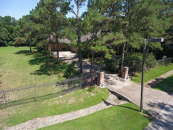 This areal shows the driveway and some of the side yard. The lot is very private.