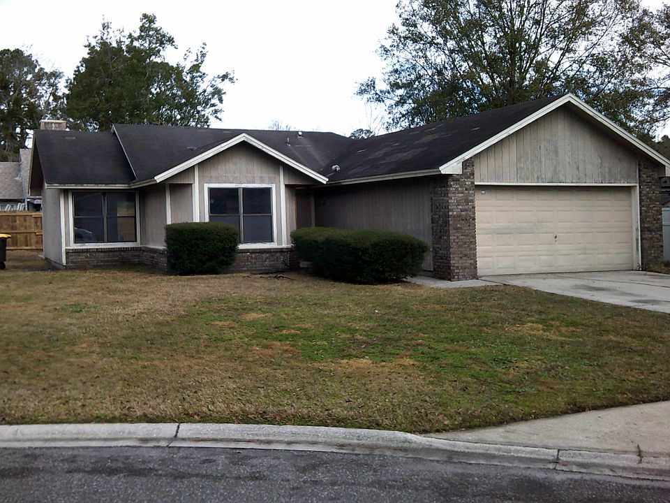 Front with 2 car garage