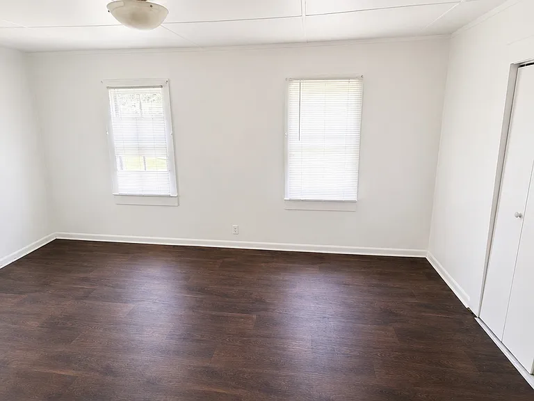 Alternate View of the Primary Bedroom highlighting the spacious layout.