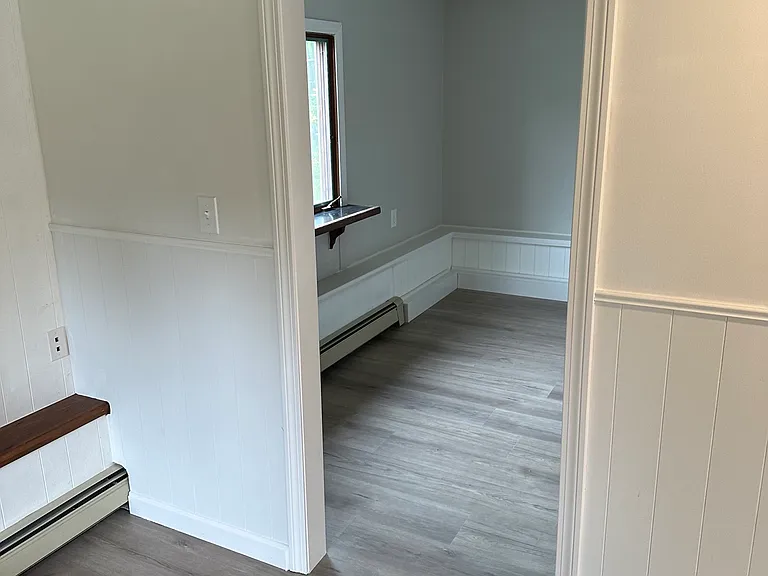 Living room looking into bedroom