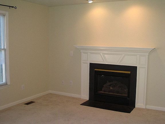 Cozy living room with gas fireplace.