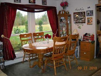 Then off into the dining area that offers lots of light from the window to gaze out at your flower g