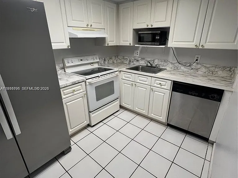 8307 SW 142nd Ave #F105 — Photo 8