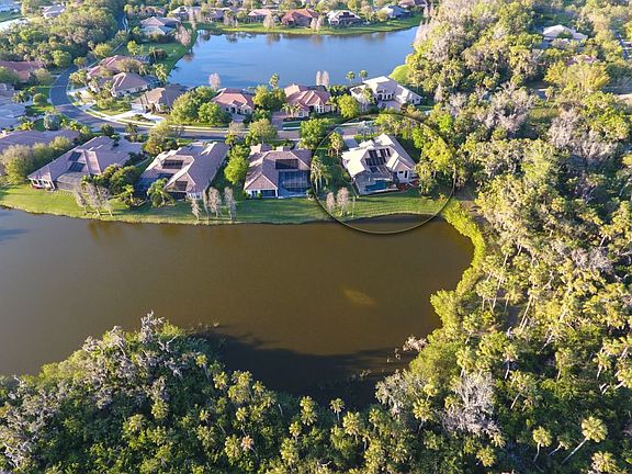Aerial view of house & lakes
