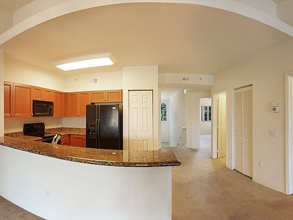 2nd image of 10115 Villagio Palms Way Unit 207