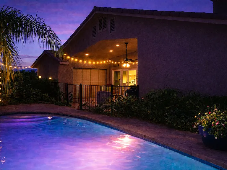 Salted mineral pool with color lights at night
