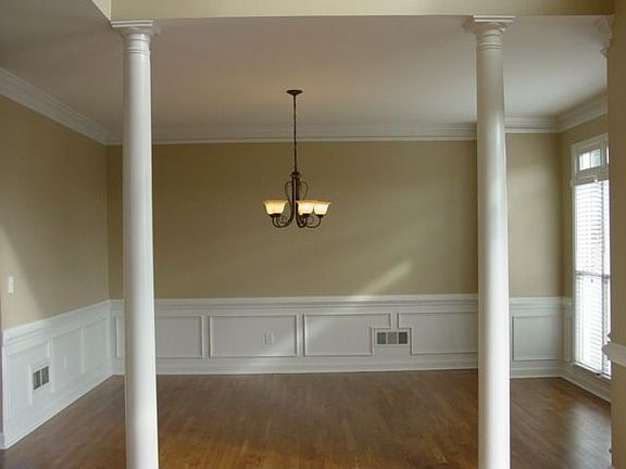 New bronze light fixtures and refinished hardwoods