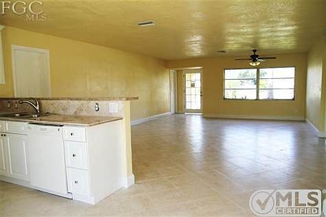Open floor plan. Diamond shape tile throughout the house