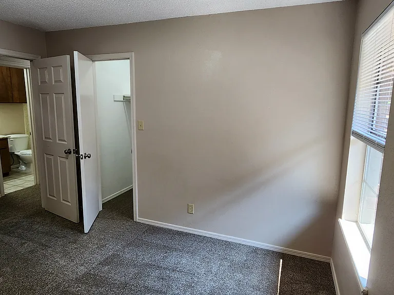 THIRD BEDROOM WITH WALK-IN CLOSET AND MAIN BATH JUST ACCROSS THE HALL.