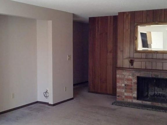 WORKING FIREPLACE AND SPACE FOR ENTERTAINMENT CENTER