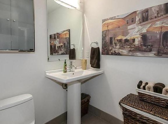Bathroom. Has a shower stall, so no need for shower curtains
