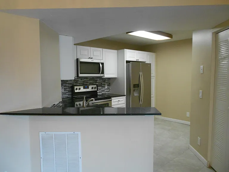 8977 Wiles Rd #203 — Photo 5