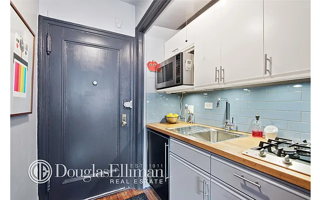 Sold by Douglas Elliman | media 10
